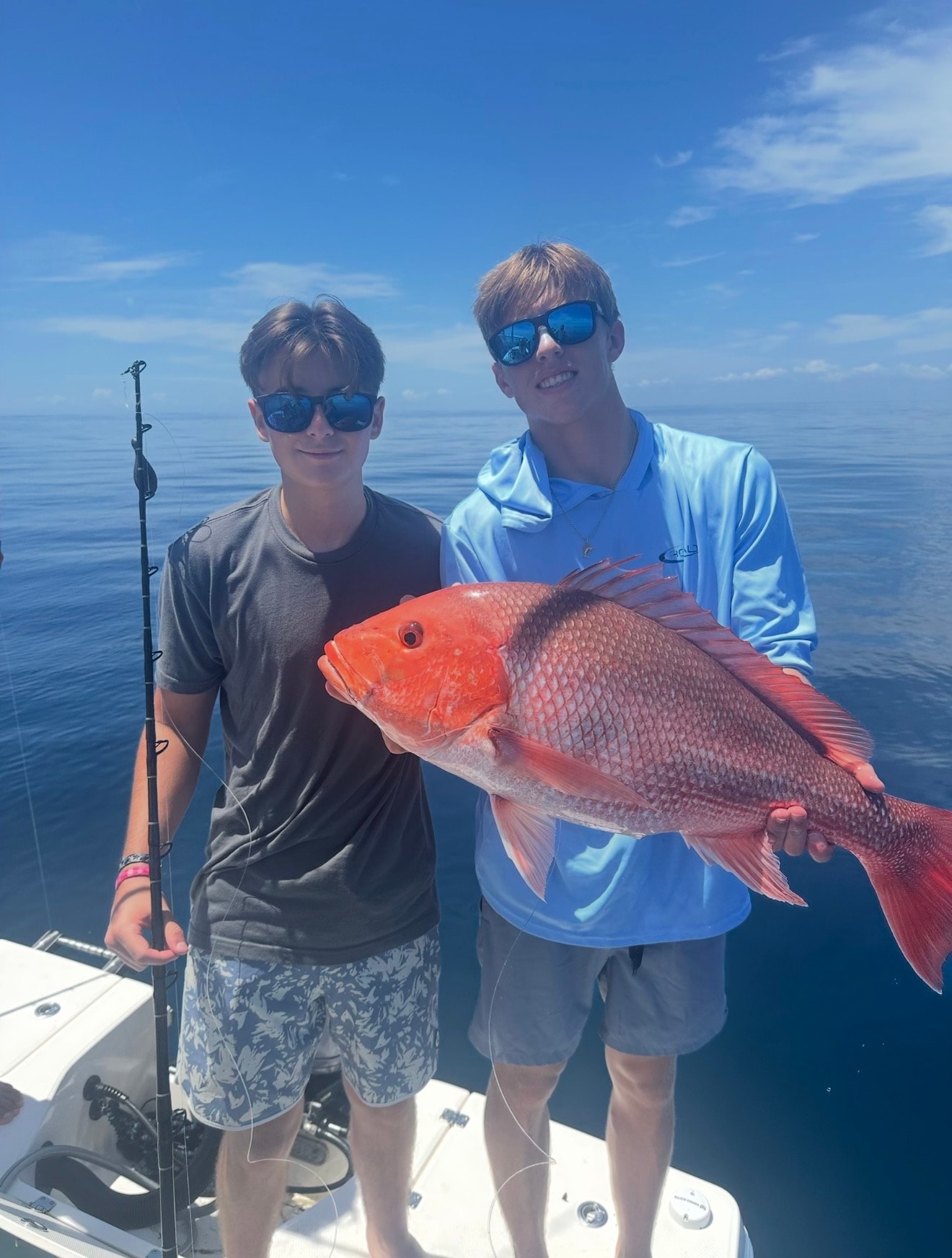 Guest enjoying a fishing adventure on the water